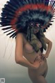 A naked woman wearing an indian headdress poses for a picture.